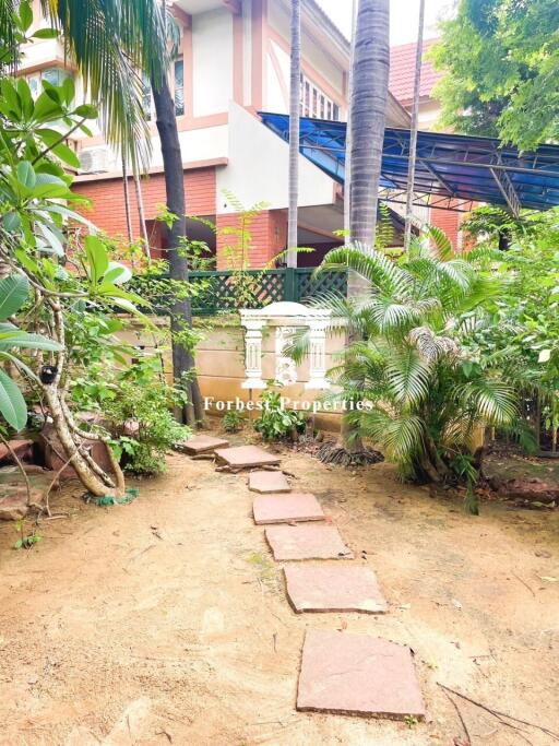 Outdoor view of the building with garden