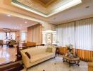 Spacious and elegantly designed living room with custom ceiling lighting