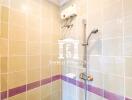 Shower area with tiled walls and built-in shelf