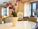 Bright dining room with a large table and elegant decor