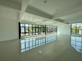 Spacious living area with large windows