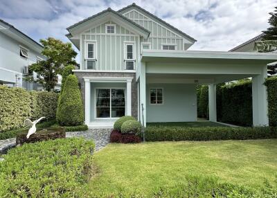 Modern two-story house with a front lawn