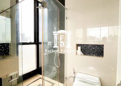 Modern bathroom with glass shower enclosure