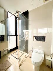 Modern bathroom with glass shower enclosure