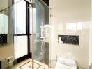 Modern bathroom with glass shower enclosure