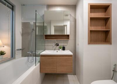 Modern bathroom with wooden accents