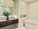 Modern bathroom with dual sinks and freestanding bathtub