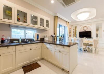 Modern kitchen with adjoining dining area