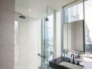 Modern bathroom with shower and city view