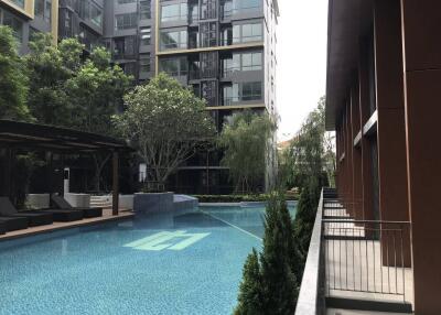 Modern apartment building with outdoor swimming pool