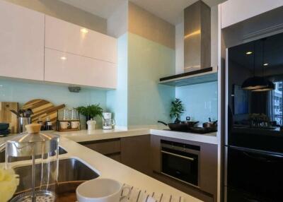 Modern kitchen with sleek appliances and fixtures