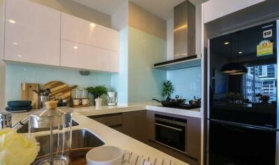 Modern kitchen with sleek appliances and fixtures