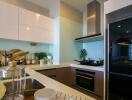 Modern kitchen with sleek appliances and fixtures