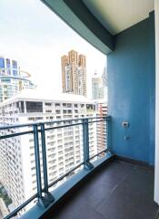 View from high-rise balcony with cityscape