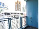 View from high-rise balcony with cityscape