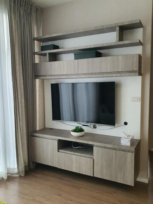 Modern living room with entertainment center