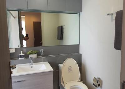 Modern bathroom with vanity and mirror