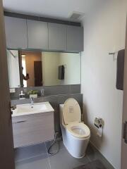 Modern bathroom with vanity and mirror