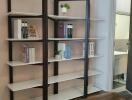 Bookshelves in the study with a view into an adjacent room