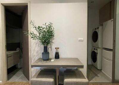 Small dining area with table and stools