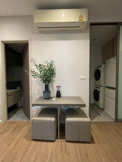 Small dining area with table and stools