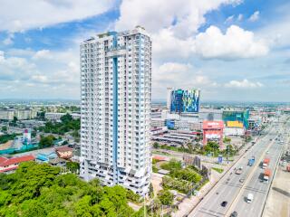 High-rise residential building with urban surroundings