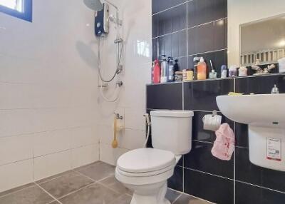 modern bathroom with shower and toiletries