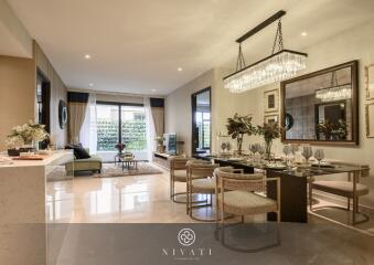 Spacious living and dining area with modern furnishings and ample natural light