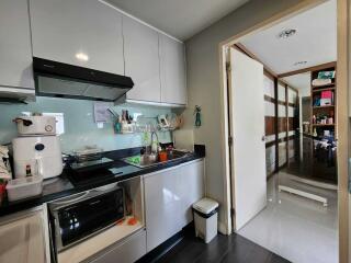 Modern kitchen with sleek cabinets and appliances