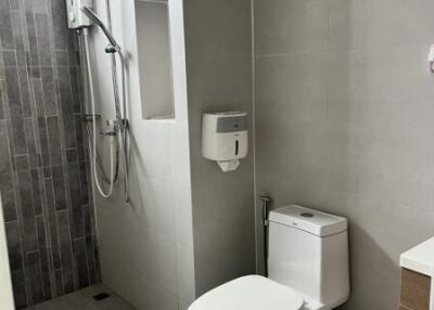 Modern bathroom with shower and toilet