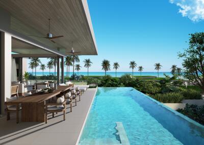 Luxurious outdoor patio with dining area and infinity pool overlooking the ocean