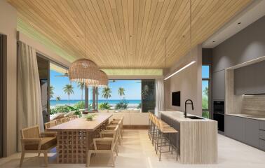 Modern open-plan kitchen and dining area with ocean view