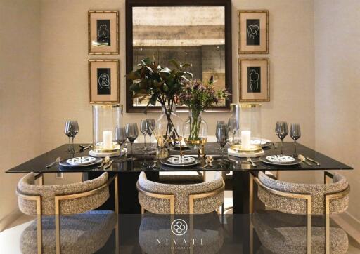 Elegant dining area with a glass table and stylish chairs