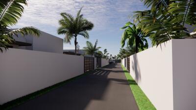 Gated driveway lined with palm trees