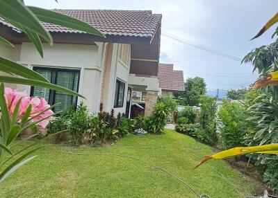 Exterior view of a house with garden