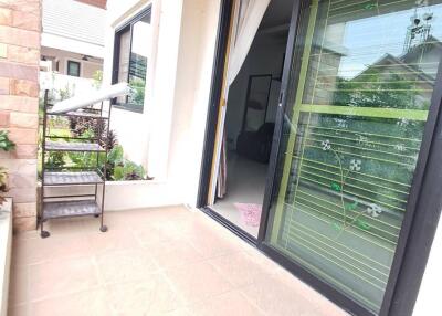 Outdoor area with view of sliding door entrance