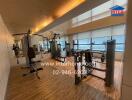 Modern gym area with various fitness equipment