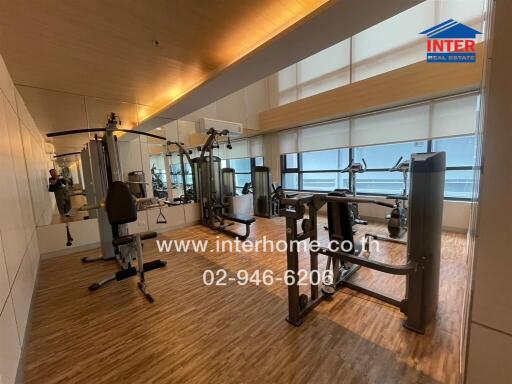 Modern gym area with various fitness equipment