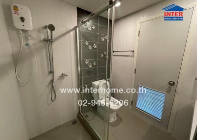 Modern bathroom with shower stall and toilet