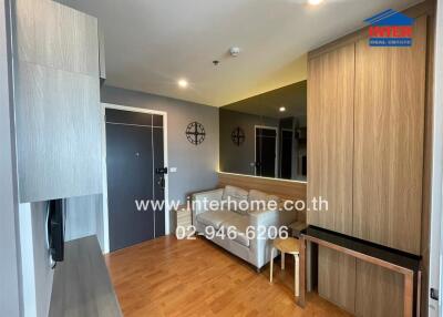 Contemporary styled living room with wooden flooring and modern furnishings