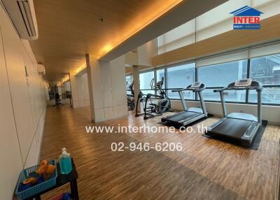 fitness center with treadmills and exercise equipment