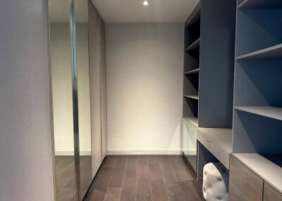 Walk-in closet with shelving and storage space