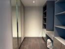 Walk-in closet with shelving and storage space