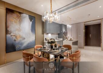 Elegant dining area with a modern kitchen