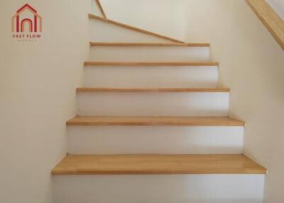 Staircase with wooden steps