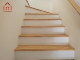 Staircase with wooden steps