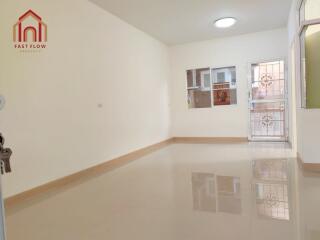 Bright and spacious living room with polished floor