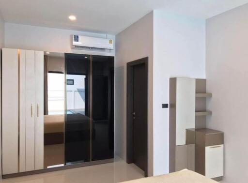 Bedroom with wardrobe and air conditioning