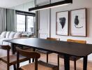 Modern dining room with wooden chairs, black dining table, and cozy living area