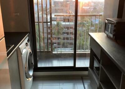 Modern kitchen with balcony view